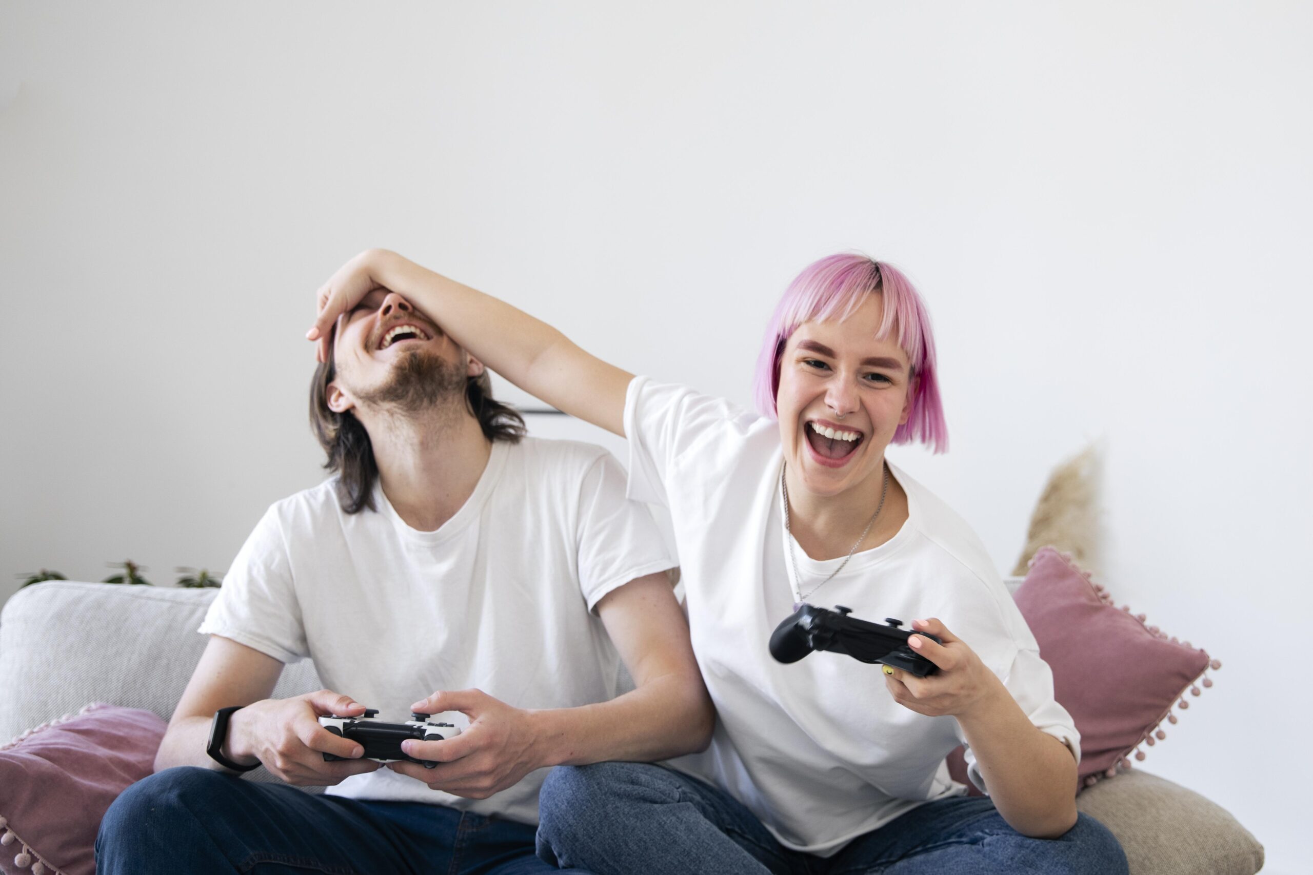 cute couple playing videogames couch 1 scaled